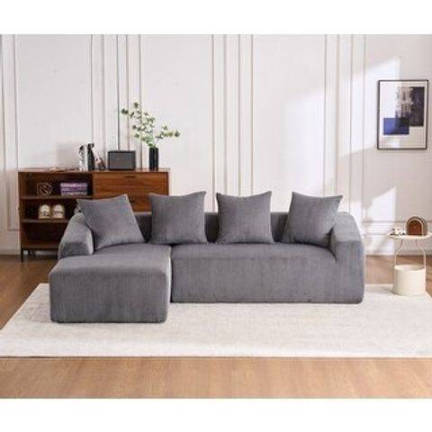 Your Guide to Ultimate Relaxation With a Gray Corduroy Sectional and Its Comfy Companions